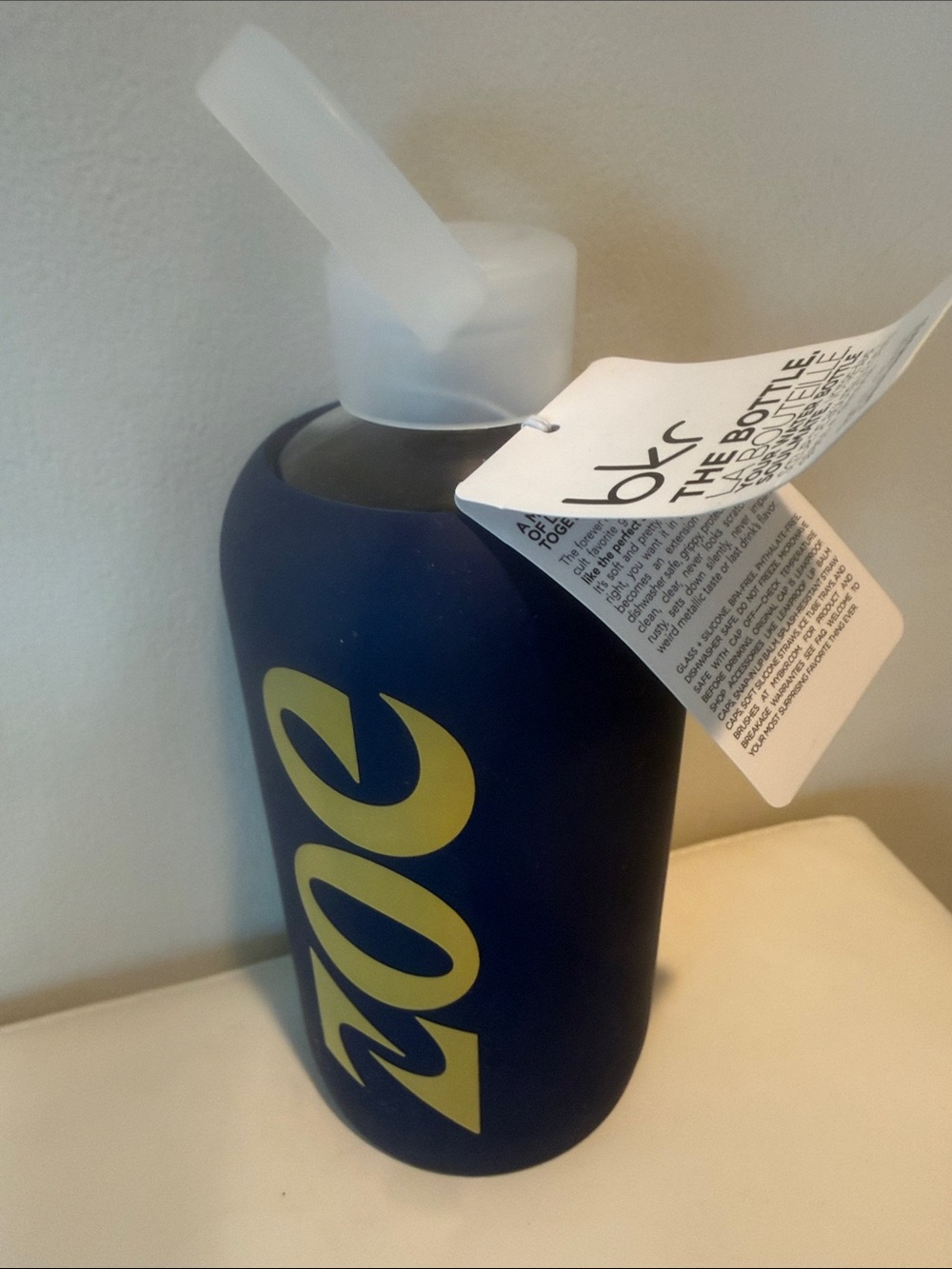 bkr 32 oz Navy Silicone Sleeve Bottle with Yellow Zoe and Translucent Cap